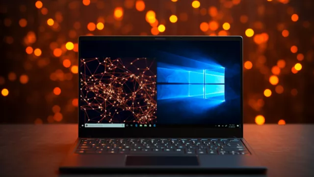 Laptop s tématikou Windows 10 na displeji